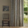 multicolour striped curtain with window and chair