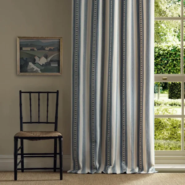 Dallington Stripe Fabric - Indigo by blue striped curtain with window and chair