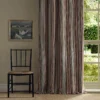 multicolour striped curtain with window and chair