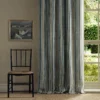 multicolour striped curtain with window and chair