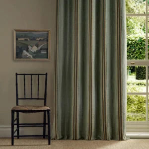 green striped curtain with window and chair