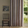 multicolour striped curtain with window and chair