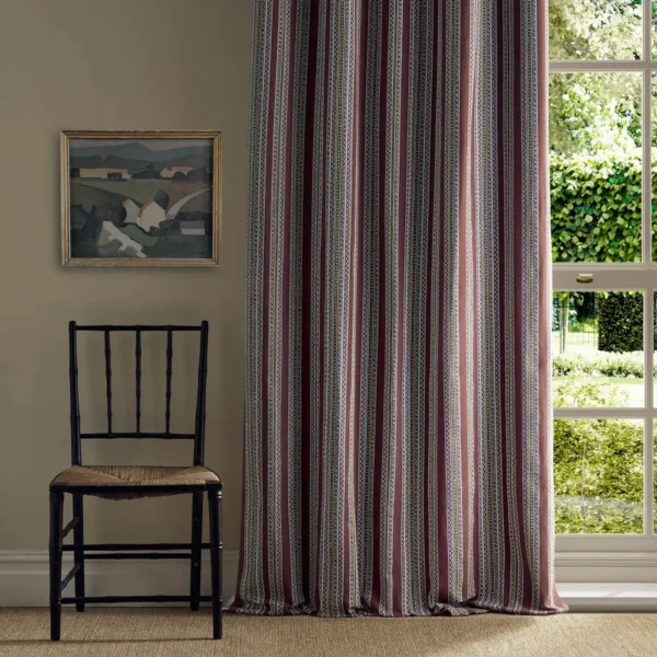 red striped curtain with window and chair