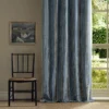 blue striped curtain with window and chair