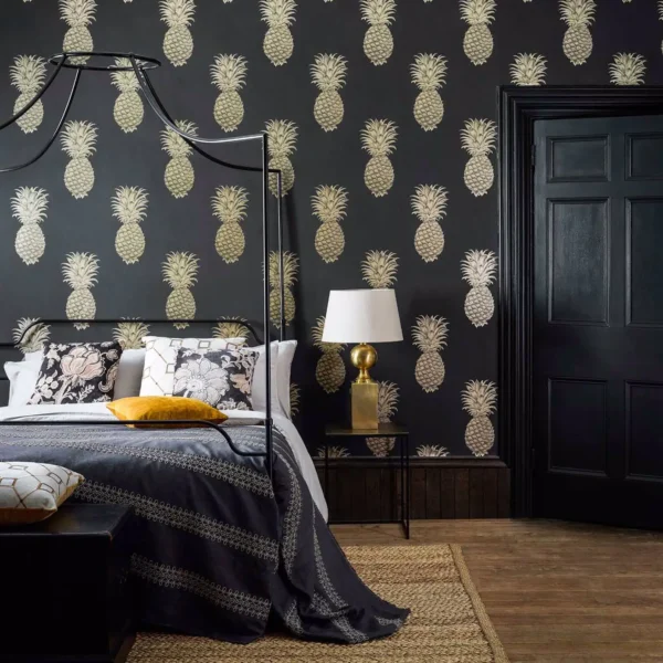 Pineapple Royale Wallpaper - Graphite / Gold by black-grey botanical wallpaper and wall with bed and door