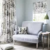 blue botanical curtain with cushion and blind