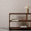 neutral contemporary wallpaper and wall with bookshelf and vases