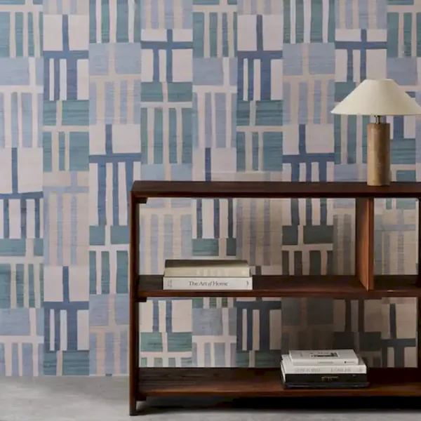 Monolith Wallpaper - Sapphire / Limestone by blue geometric wallpaper and wall with bookshelf and vases