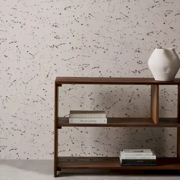 Moho Wallpaper - Agate by black-grey spotted wallpaper and wall with bookshelf and vases