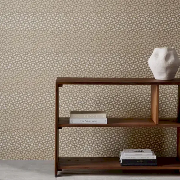 Loam Wallpaper - Sandstone by brown spotted wallpaper and wall with bookshelf and vases