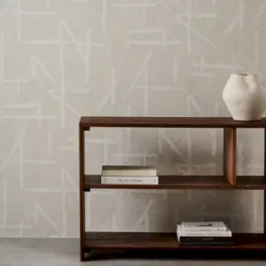 black-grey geometric wallpaper and wall with bookshelf and vases