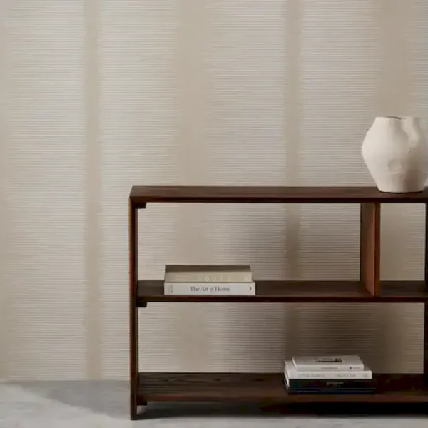Chaco Wallpaper - Porcelain by neutral striped wallpaper and wall with bookshelf and vases