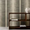 black-grey striped wallpaper and wall with bookshelf and vases