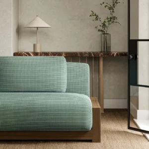 black-grey plain sofa with side table and vases