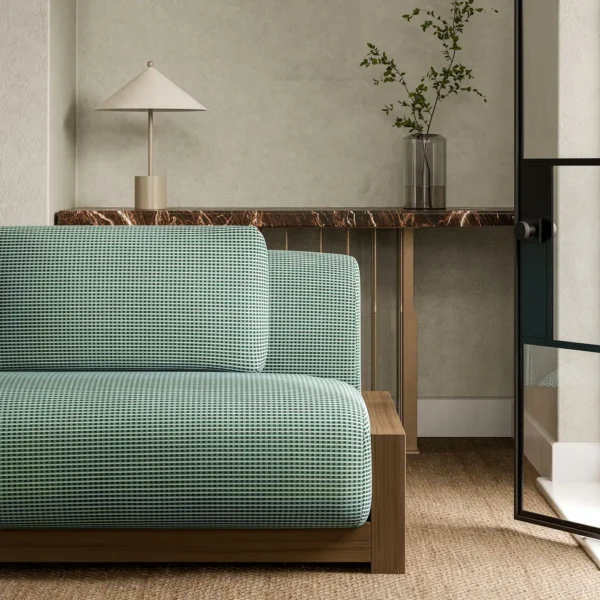 Ore Fabric - Kyanite by black-grey plain sofa with side table and vases