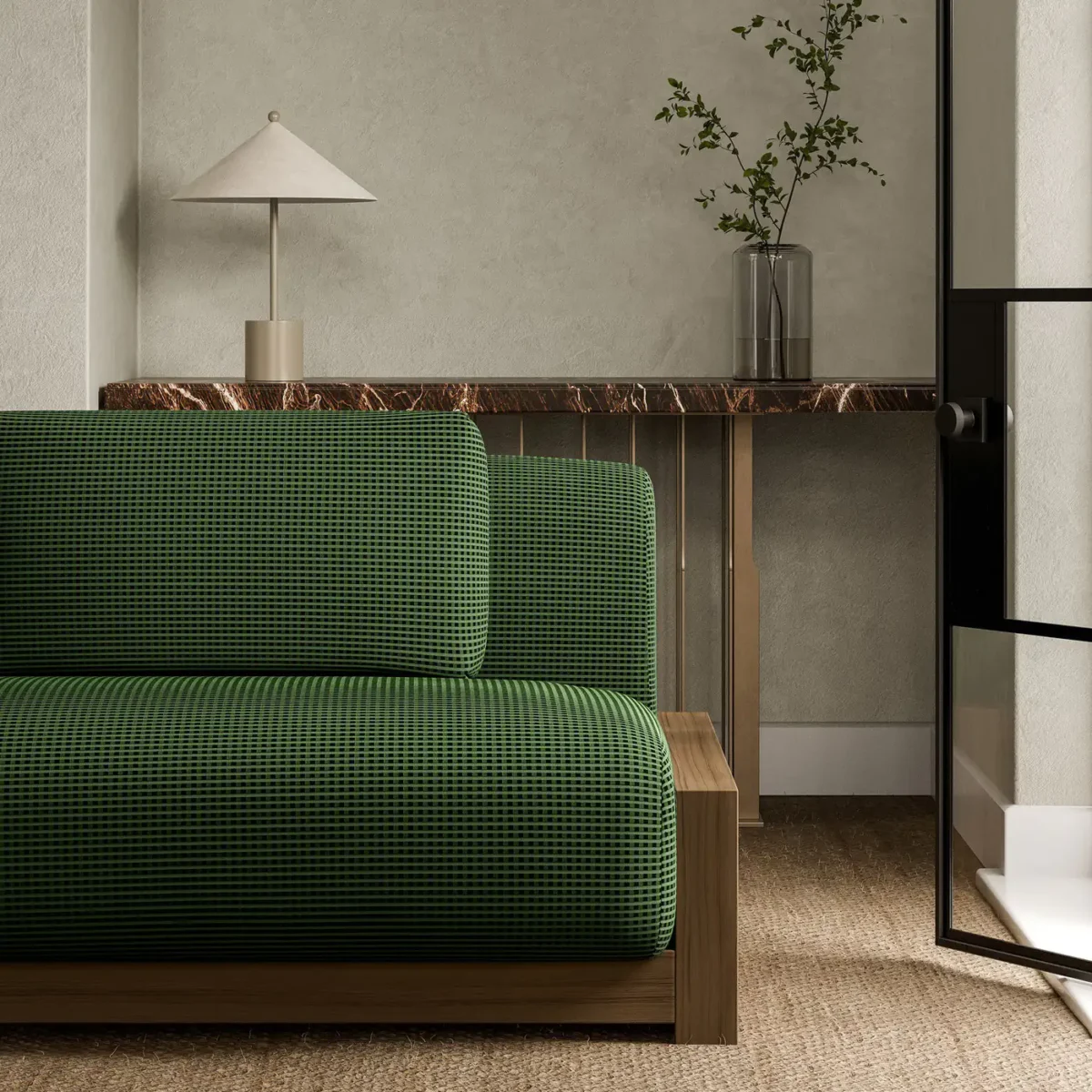 green plain sofa with side table and vases