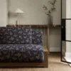 blue misc sofa with side table and vases