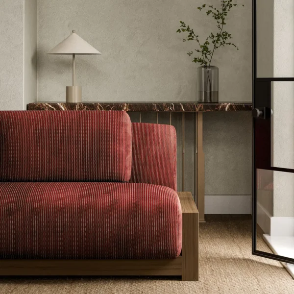 Karst Fabric - Garnet by purple striped sofa with side table and vases