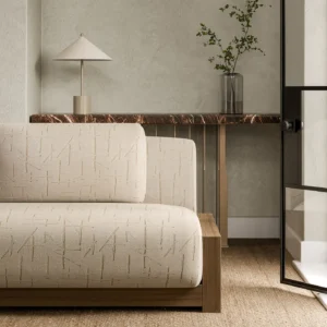 white geometric sofa with side table and vases