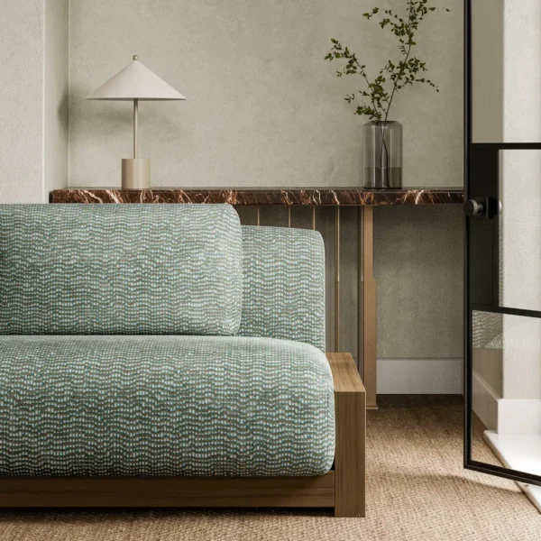 black-grey plain sofa with side table and vases