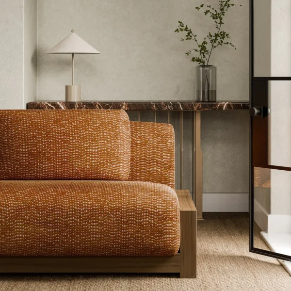 Chert Fabric - Tiger by orange plain sofa with side table and vases