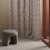 neutral misc curtain with armchair and window