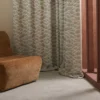 green misc curtain with armchair and window