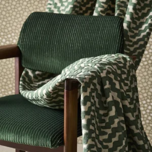 green misc curtain with chair and wall