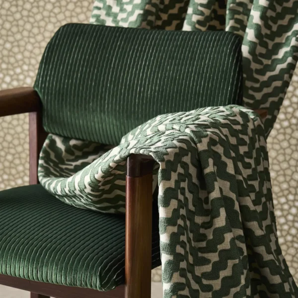 green misc curtain with chair and wall