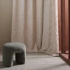 neutral misc curtain with armchair and window