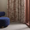 red contemporary curtain with armchair and window