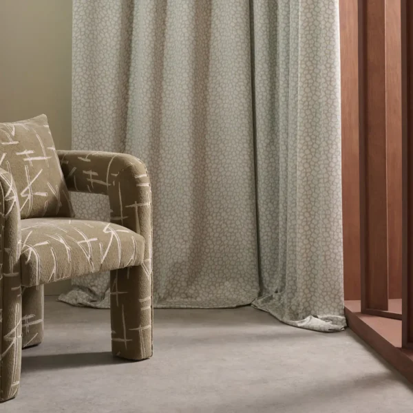 Loam Fabric - Meadow by blue spotted curtain with armchair and window