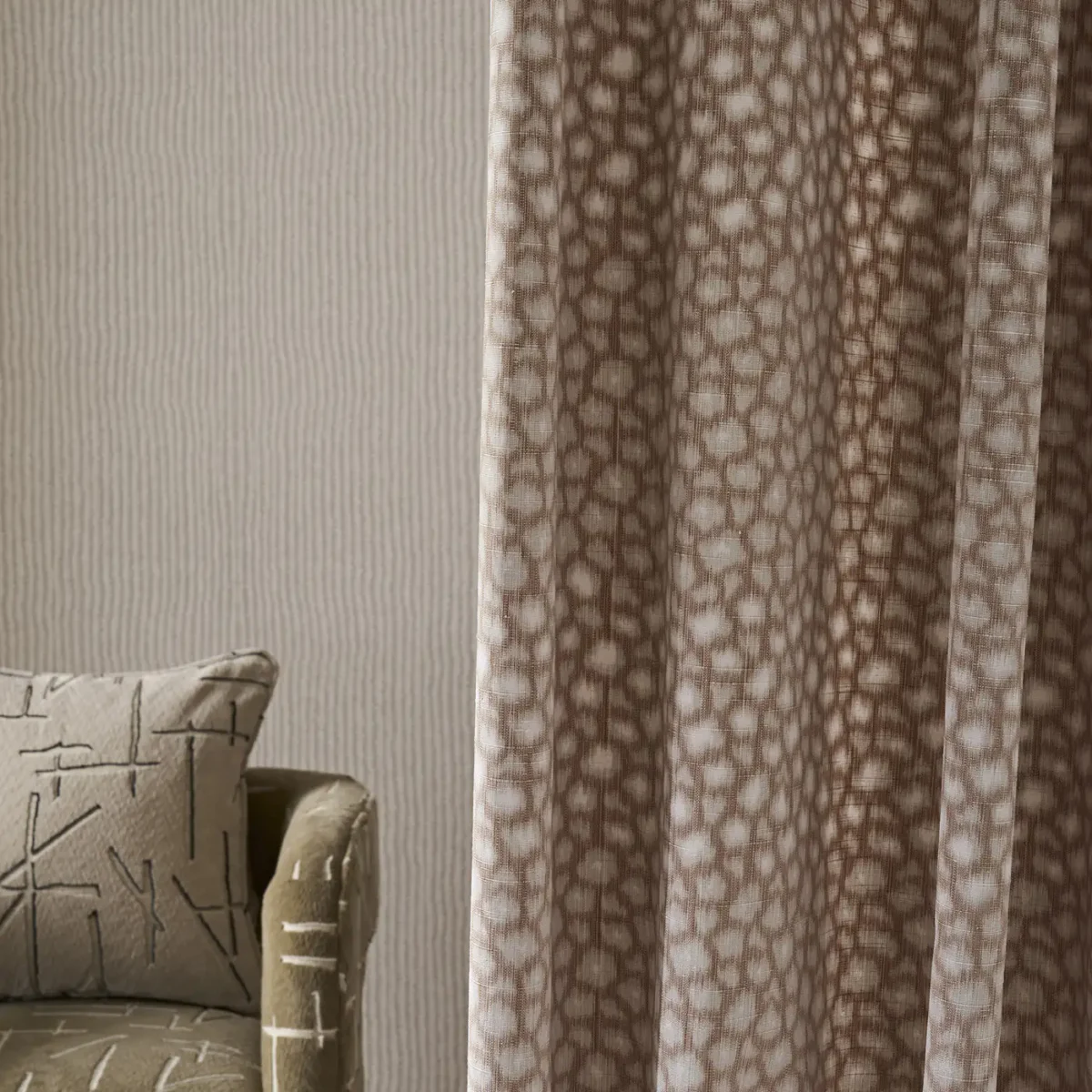 Loam Fabric - Rust by red spotted curtain with wall and cushion