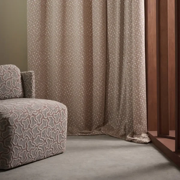 Loam Fabric - Rust by red spotted curtain with armchair and window