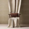 green spotted curtain with chair and wall