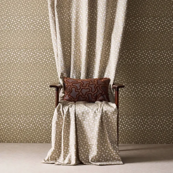 Loam Fabric - Olivine by green spotted curtain with chair and wall