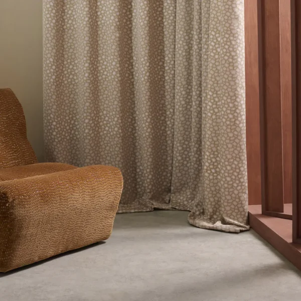 Loam Fabric - Olivine by green spotted curtain with armchair and window