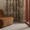 yellow contemporary curtain with armchair and window