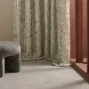 green misc curtain with armchair and window