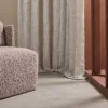 blue misc curtain with armchair and window
