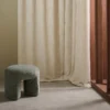 neutral misc curtain with armchair and window