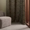 brown misc curtain with armchair and window