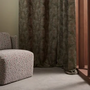 brown misc curtain with armchair and window