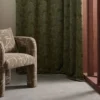 green misc curtain with armchair and window