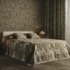 green striped curtain with bed and wall