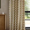 yellow geometric curtain with cabinets and window