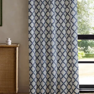 blue geometric curtain with cabinets and window