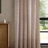 pink striped curtain with cabinets and window