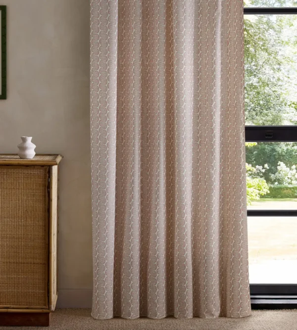 pink striped curtain with cabinets and window