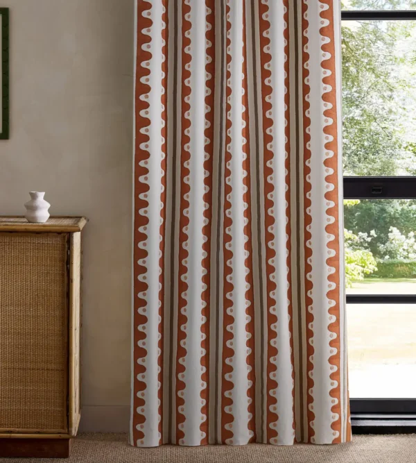 Oakham Embroidery Fabric - Tomato by red striped curtain with cabinets and window